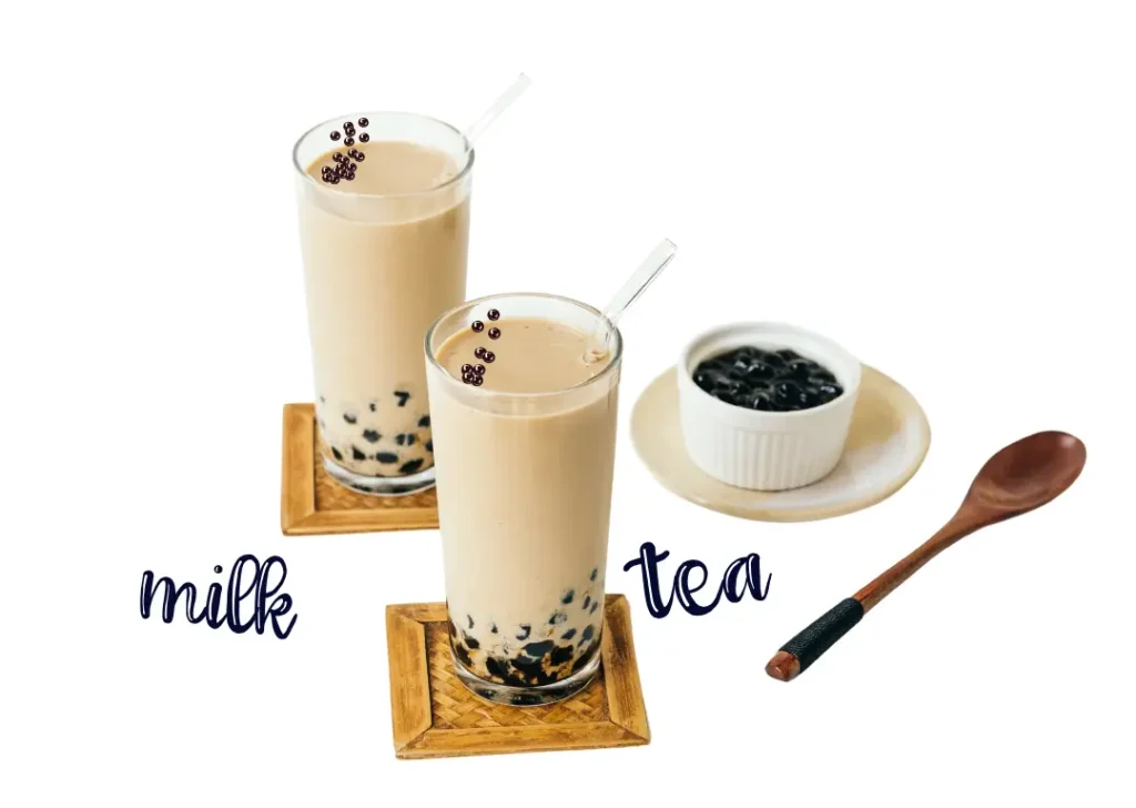 bubble tea with tapioca pearls, served on wooden coasters with wooden spoon accompanied by a bowl of black tapioca pearls with milk flavor.